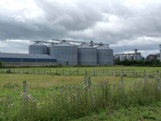 Photo 6x4 Grain silos at Belford Station Belford\/NU1033 These are just a c2010