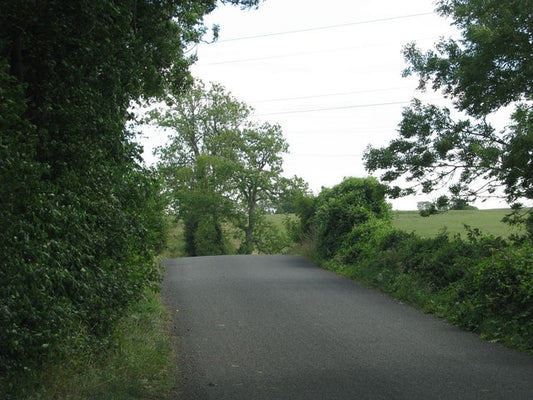 Photo 6x4 Minor road rises to cross the railway bridge Awre  c2010