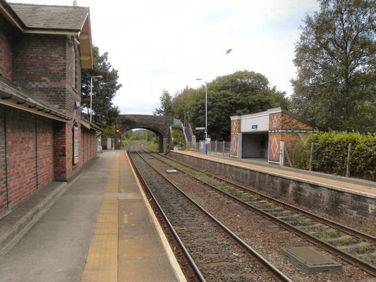 Photo 6x4 Plumley Station Looking south along the platform. The wall on t c2010