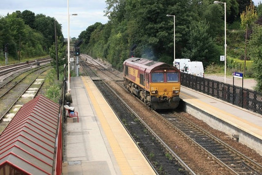 Photo 6x4 Knottingley station looking west A locomotive passes through th c2010