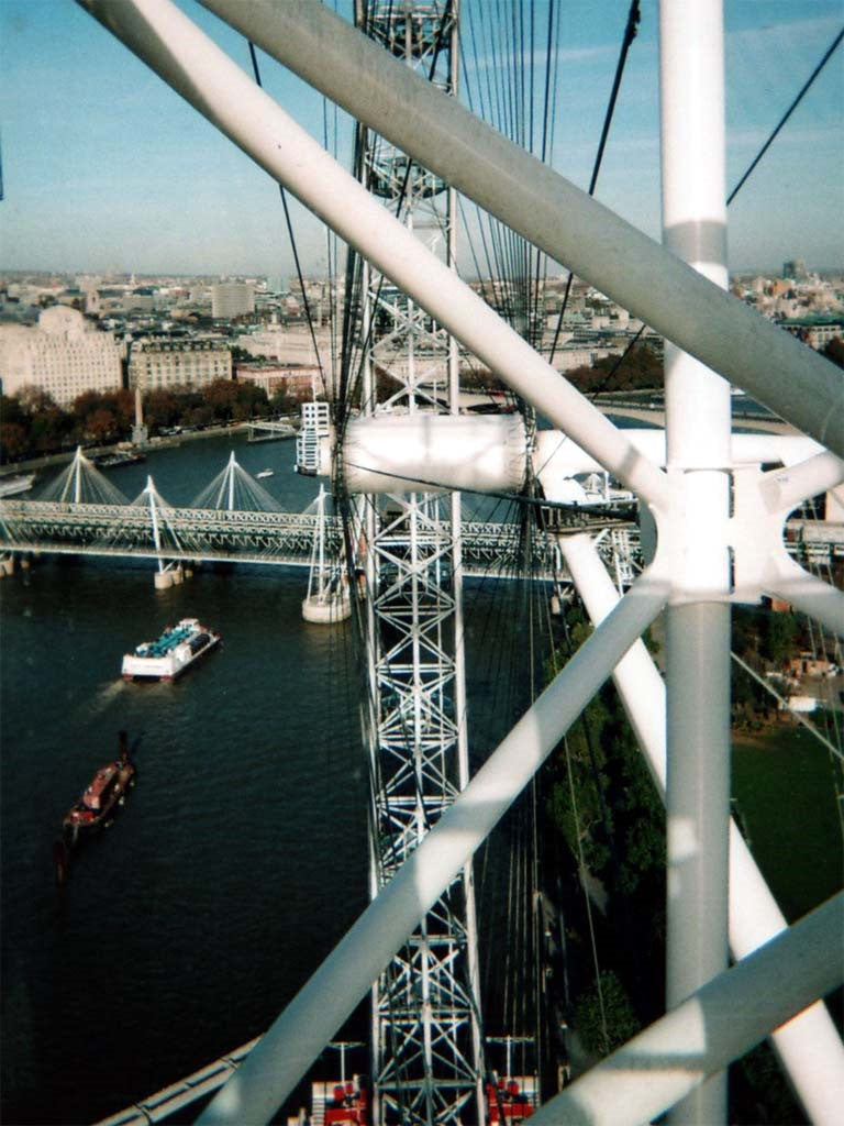 Photo 6x4 View of railway bridge through the London Eye Westminster  c2007