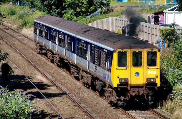 Photo 6x4 Railway near Larne Harbour Larne\/D4002 The 12.44 to Belfast Gt c2010