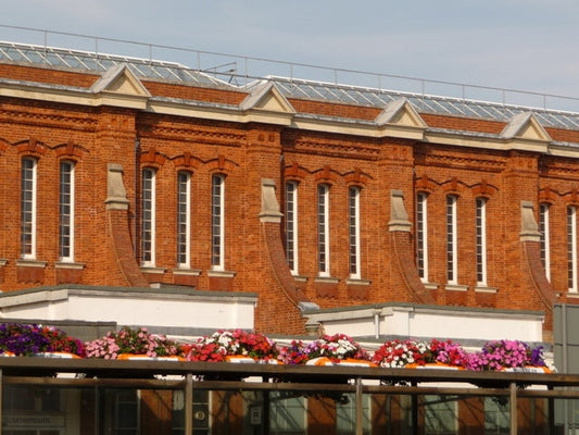 Photo 6x4 Bournemouth: station fa\u00c3\u00a7ade and bus-stop flower boxe c2010