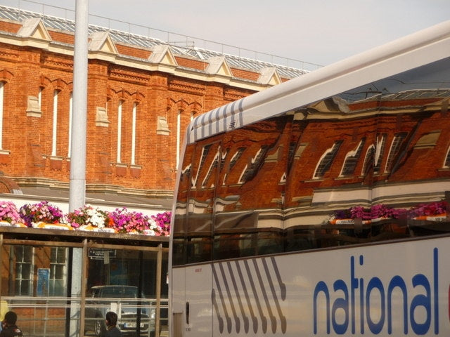 Photo 6x4 Bournemouth: station fa\u00c3\u00a7ade reflected in a coach The c2010