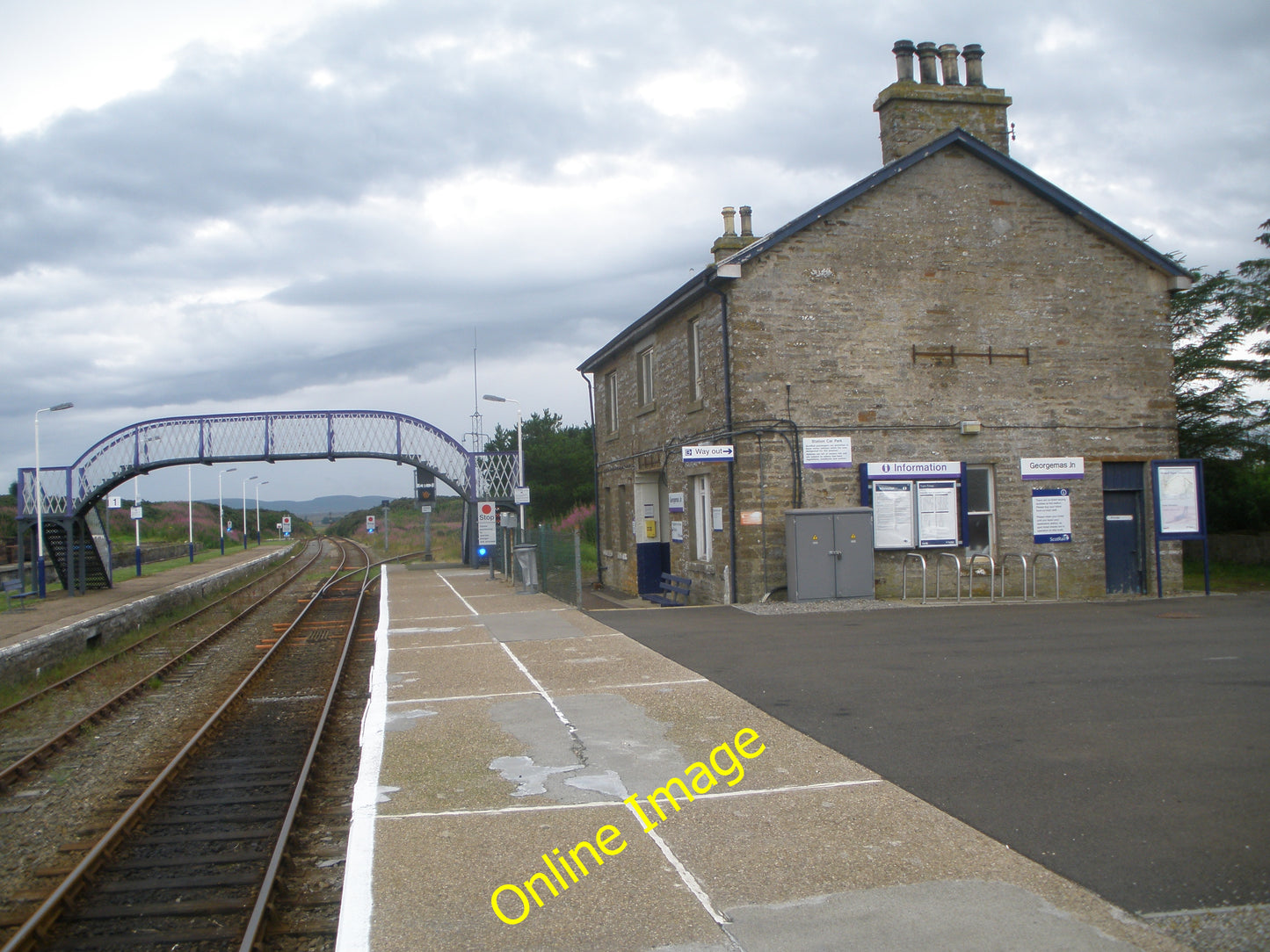 Photo 12x8 Georgemas Junction Station Roadside\/ND1560  c2010