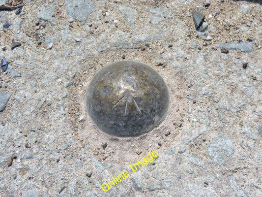 Photo 12x8 OSBM bolt benchmark  on promenade (Llandudno Tide Gauge Aux 3), c2010