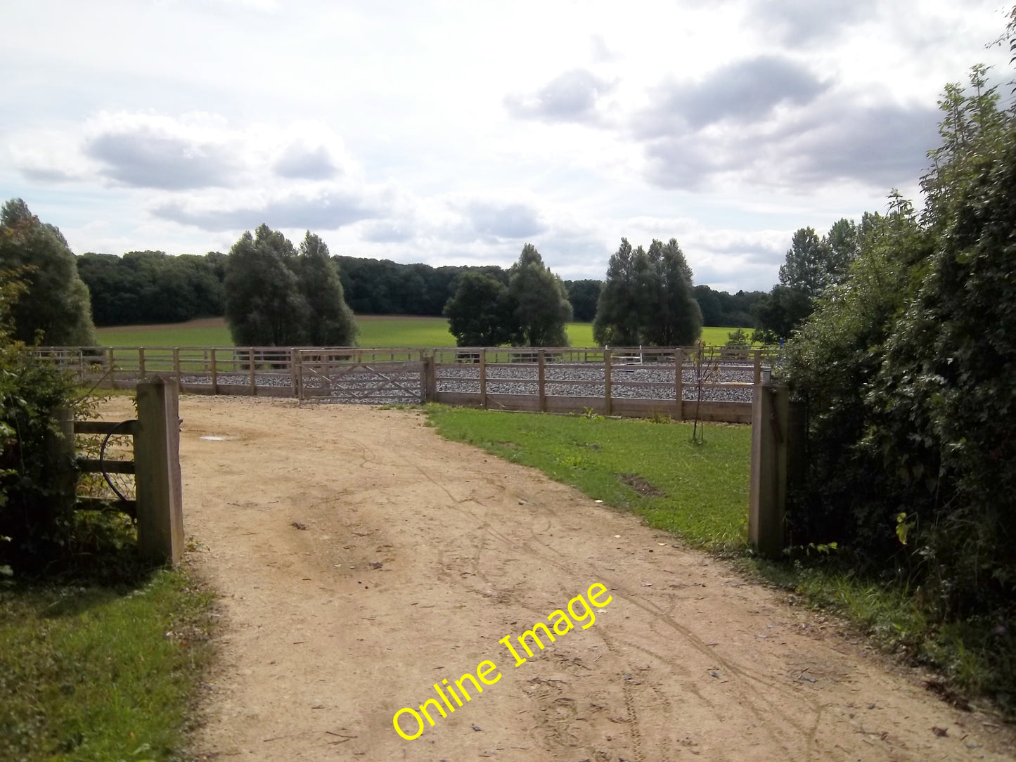 Photo 6x4 Dressage training Sarsden Tucked into the angle of the two mino c2010