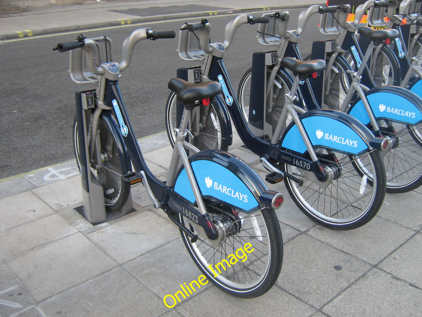 Photo 6x4 Close-up of Bikes in Barclays Bike Hire Docking Station on Eliz c2010