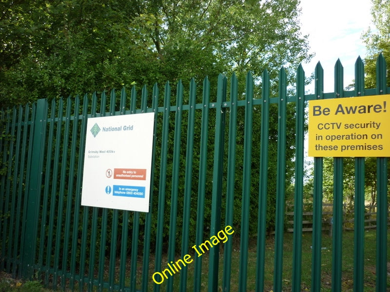 Photo 6x4 The gates to Wybers Wood Sub Station Great Coates On the Outski c2010