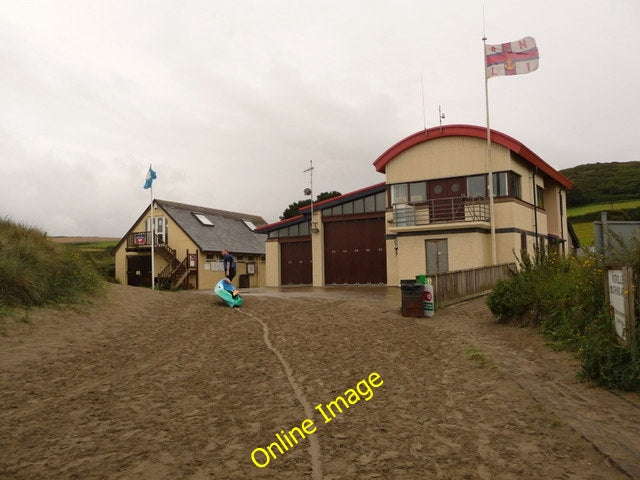 Photo 6x4 Poppit: lifeboat station Cardigan\/Aberteifi A small boat cuts  c2010