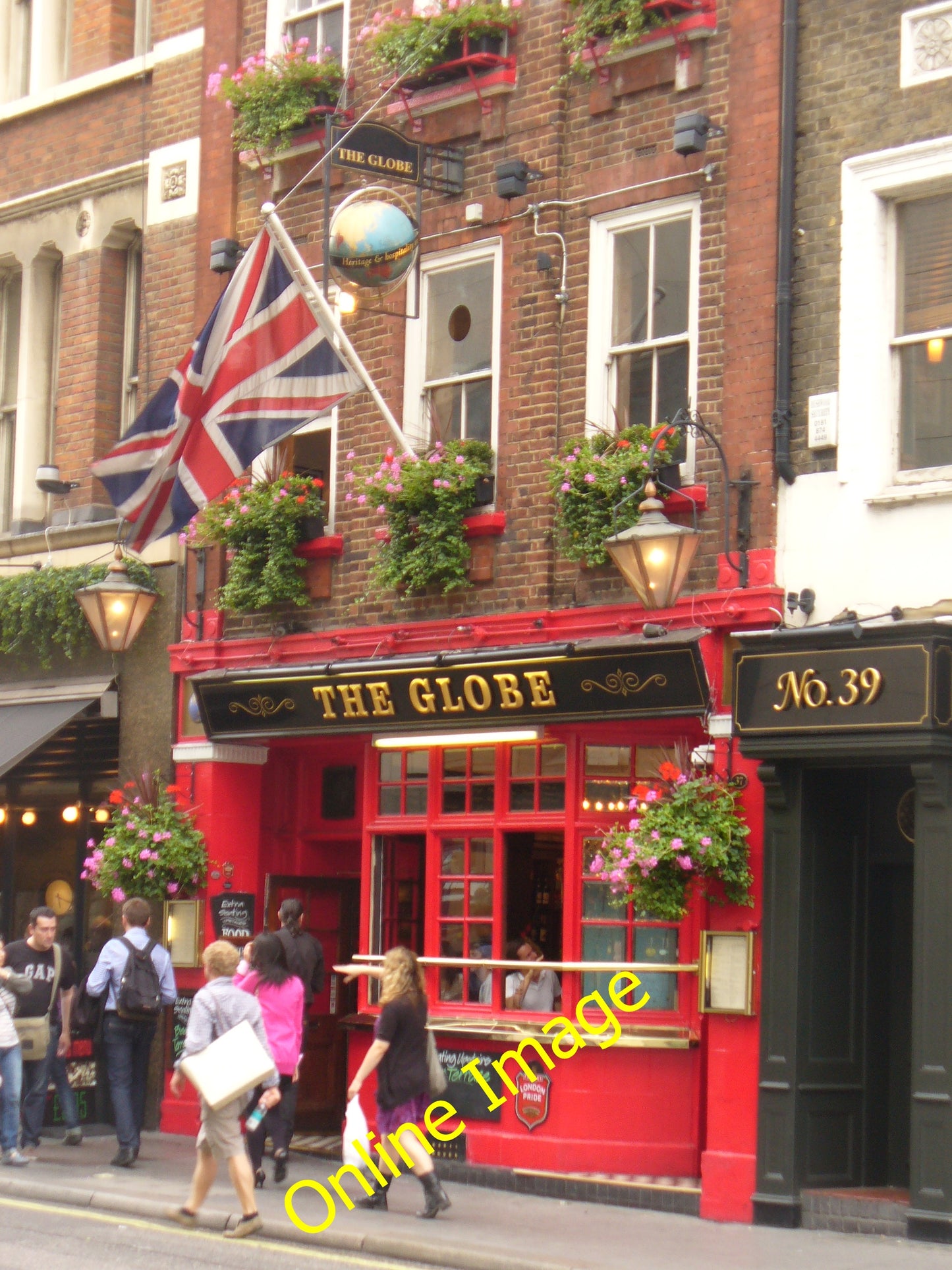 Photo 6x4 The Globe London Bow Street with a real globe for its sign hang c2010