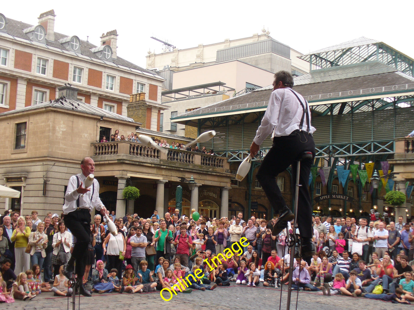 Photo 6x4 Covent Garden Entertainers London Two trick cyclists draw the c c2010