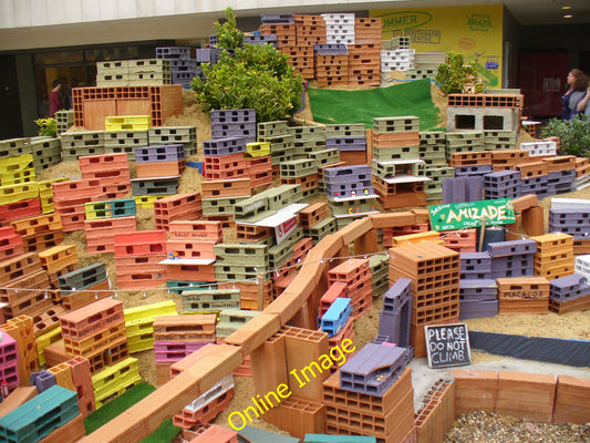 Photo 12x8 Favelas in London Project Morrinho, a growing sculpture outside c2010