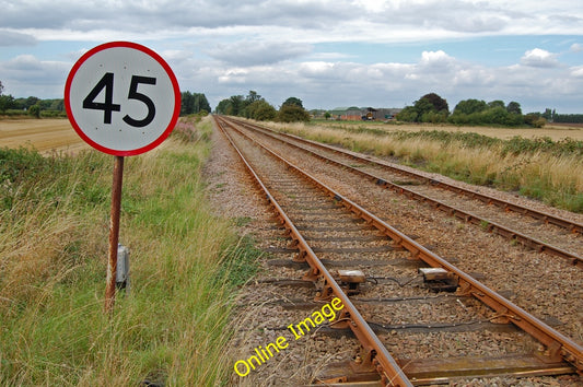 Photo 12x8 The Railway towards Goxhill South End\/TA1120 College Farm is v c2010