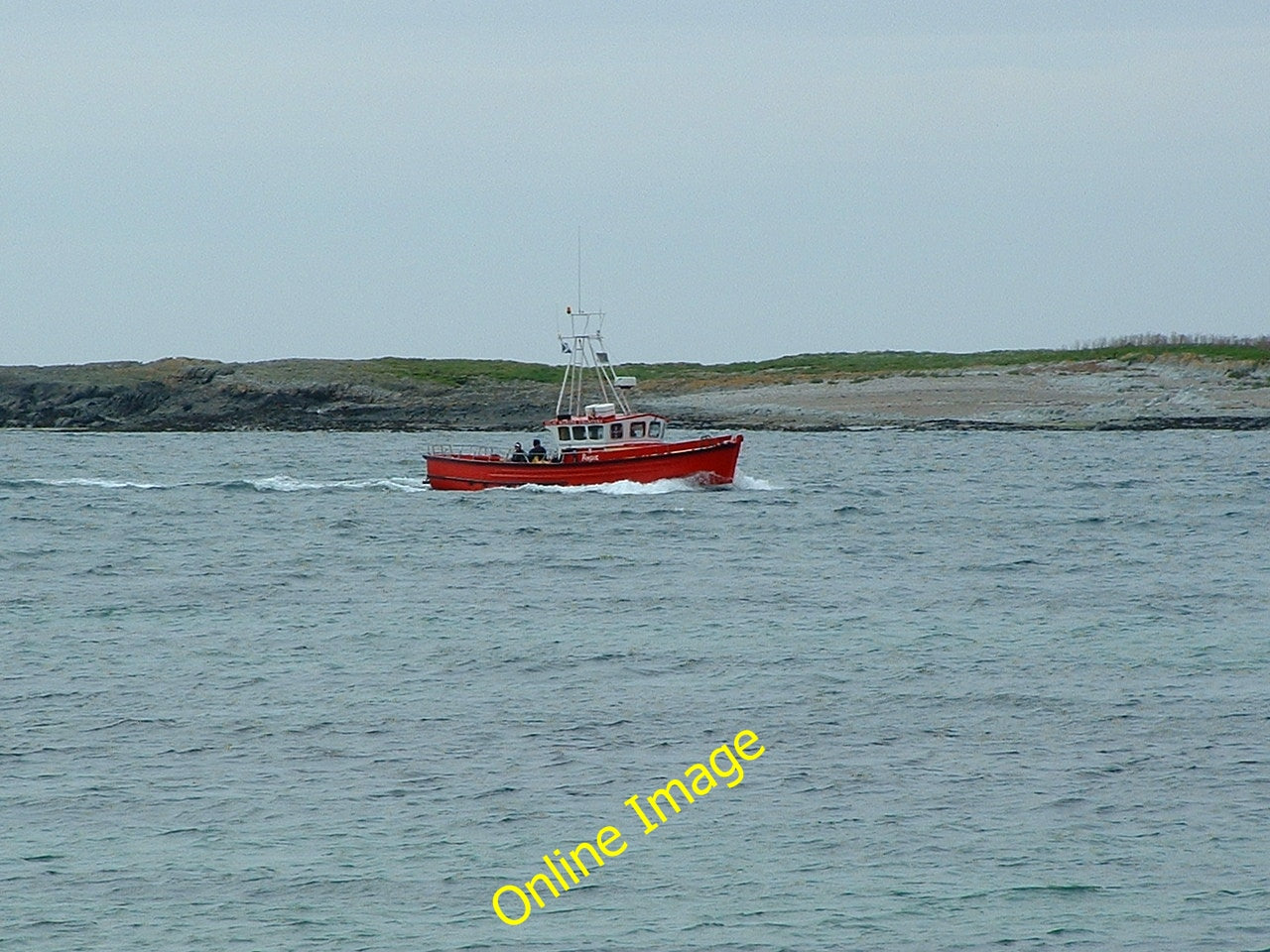 Photo 6x4 Fishing boat in front of the shingle beach on the eastern side  c2002