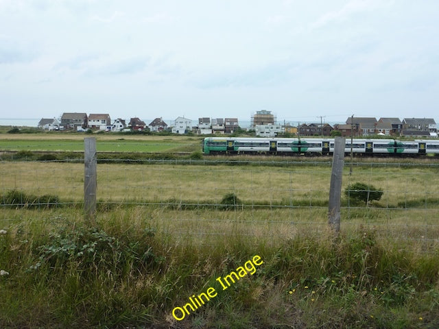 Photo 6x4 Train heading east near Norman's Bay  c2010