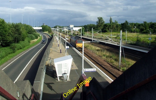 Photo 6x4 Cardonald railway station A diesel loco runs light towards Glas c2010