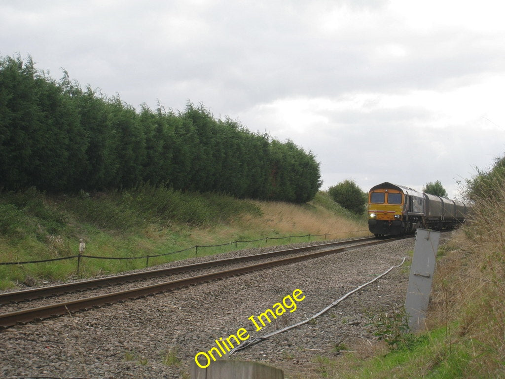 Photo 6x4 Train at Swinesdyke level crossing Northorpe\/SK8997 66732 is h c2010