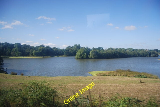 Photo 6x4 Lake by the railway line north of Tonbridge An old gravel pit. c2010