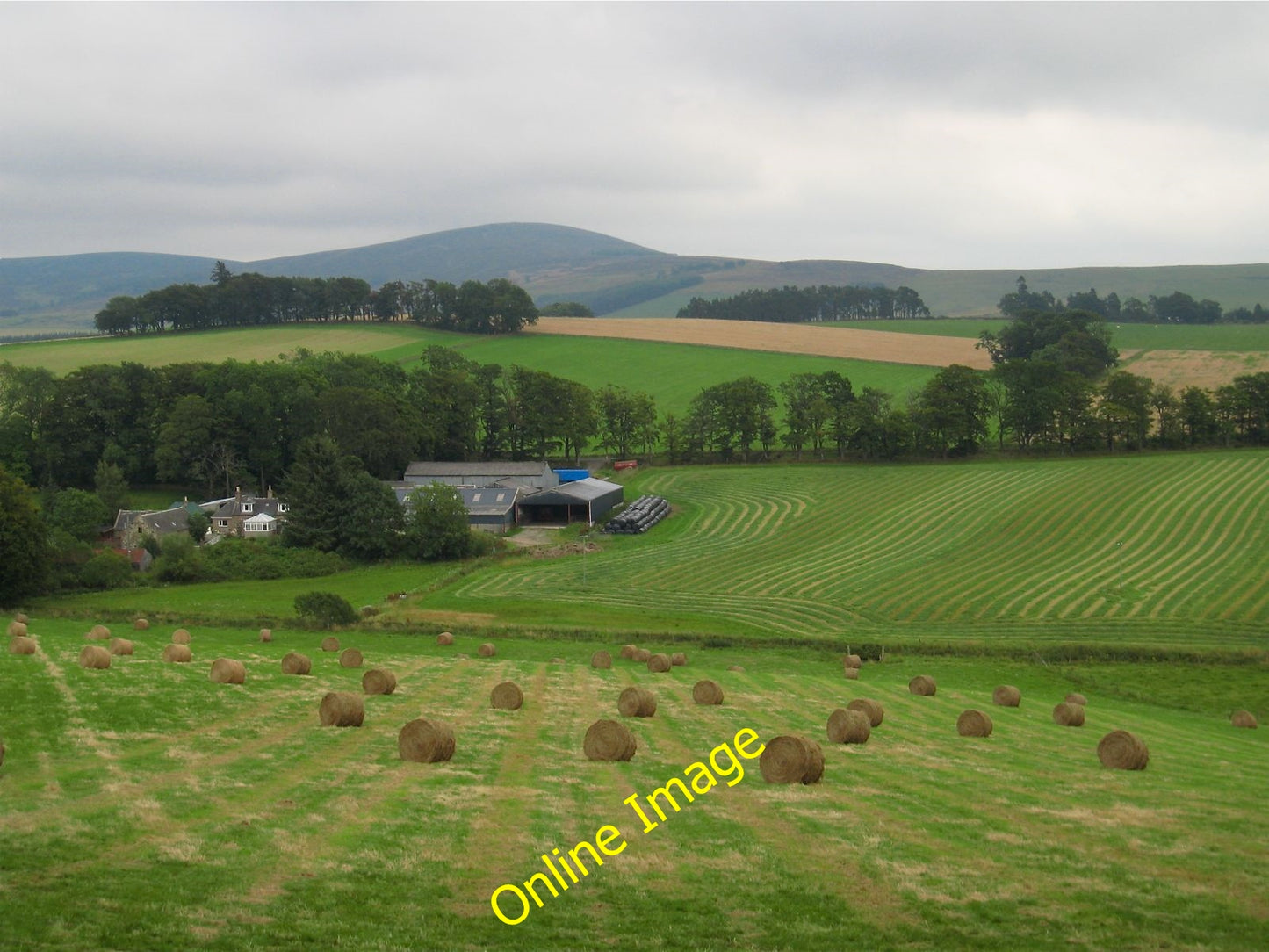 Photo 6x4 Mill of Kintocher: hay-making Muir of Fowlis Late hay-making at c2010